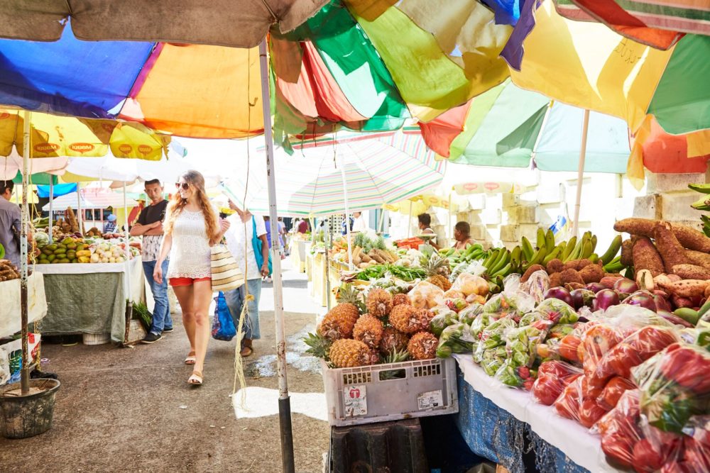 Woman Walking in a Market